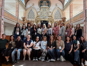 Group of women sitting at a synagogue 