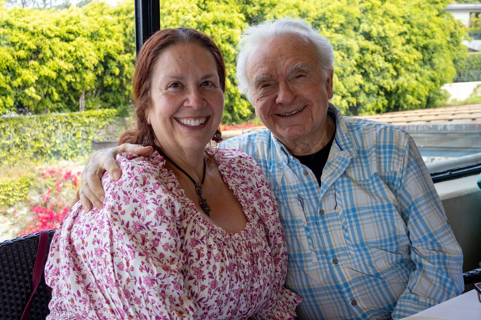 Two friends smiling together at the New Life Club