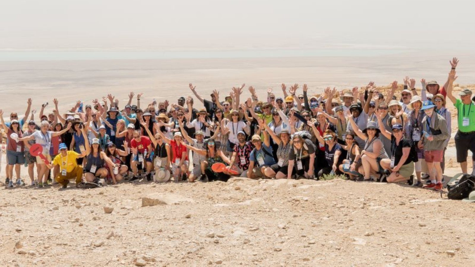 San Diego community members cheering together in the desert